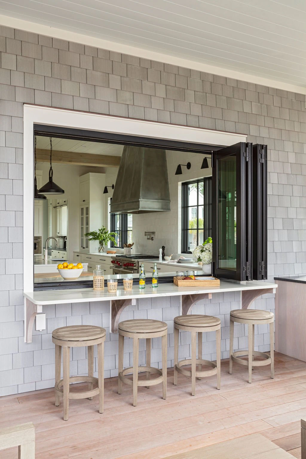 Sliding glass wall to an outdoor dining area, Daniel Island.