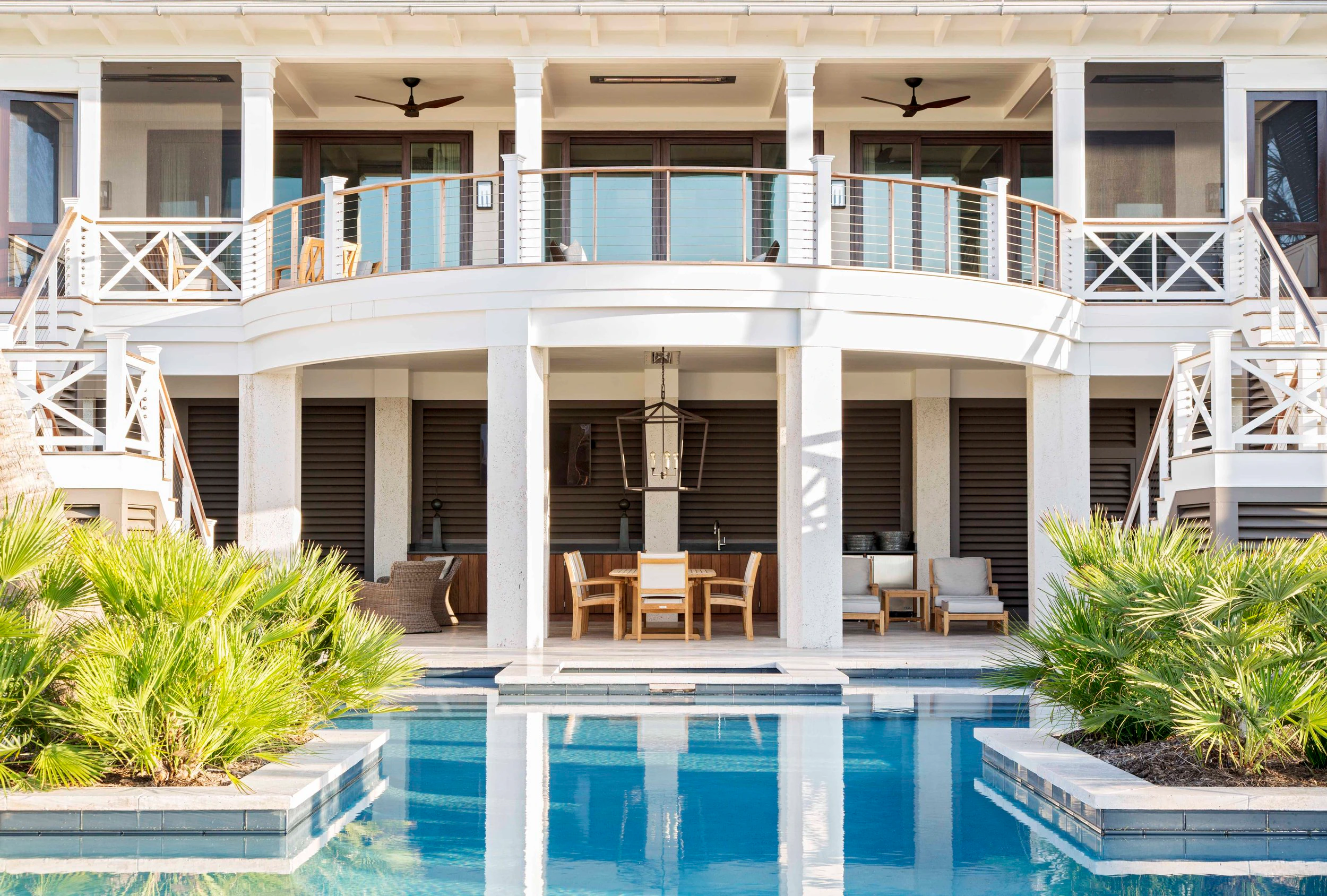 Curved porch exterior of an Isle of Palms home by Herlong.