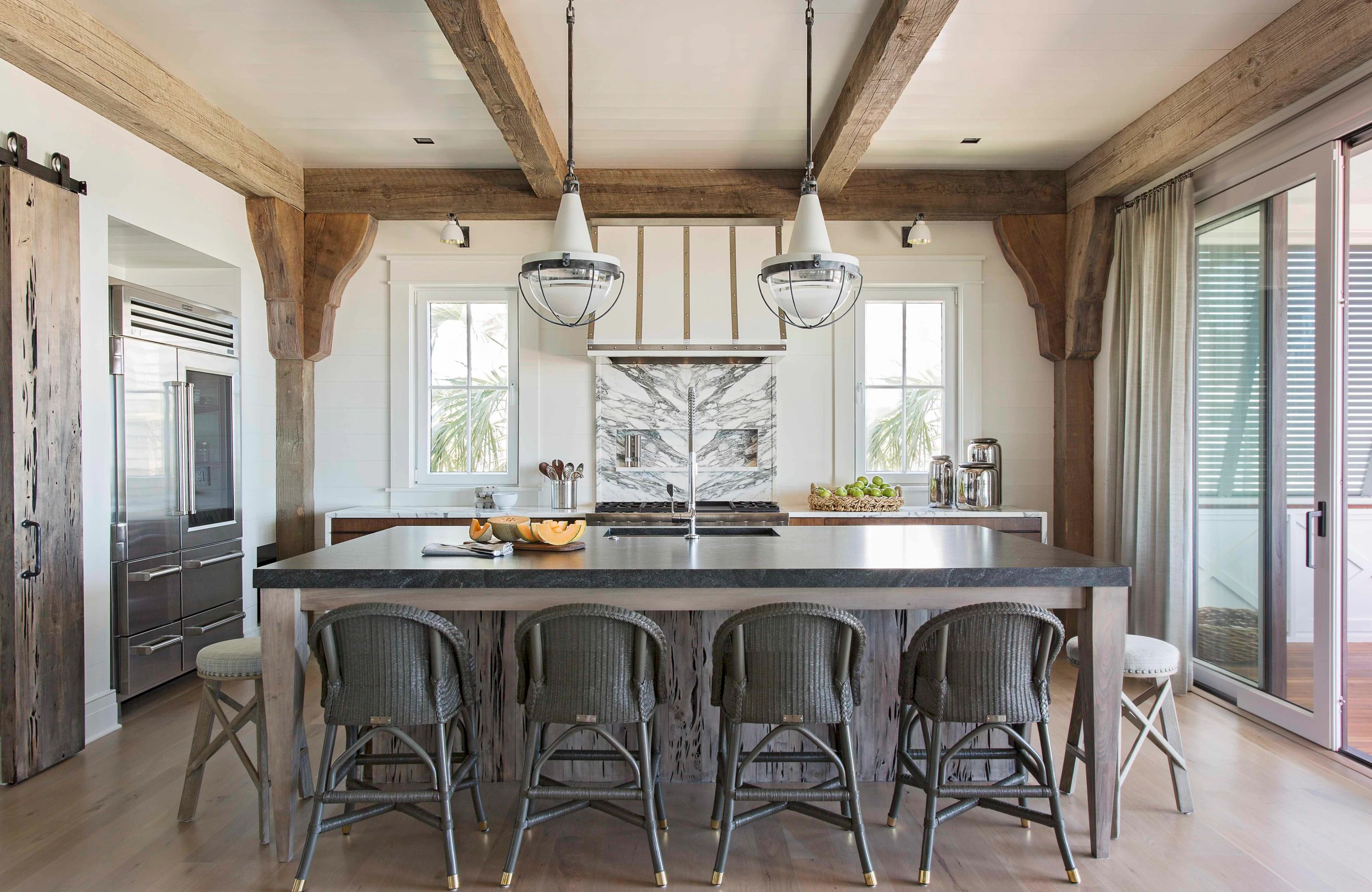 Kitchen with exposed beams in an Isle of Palms home.